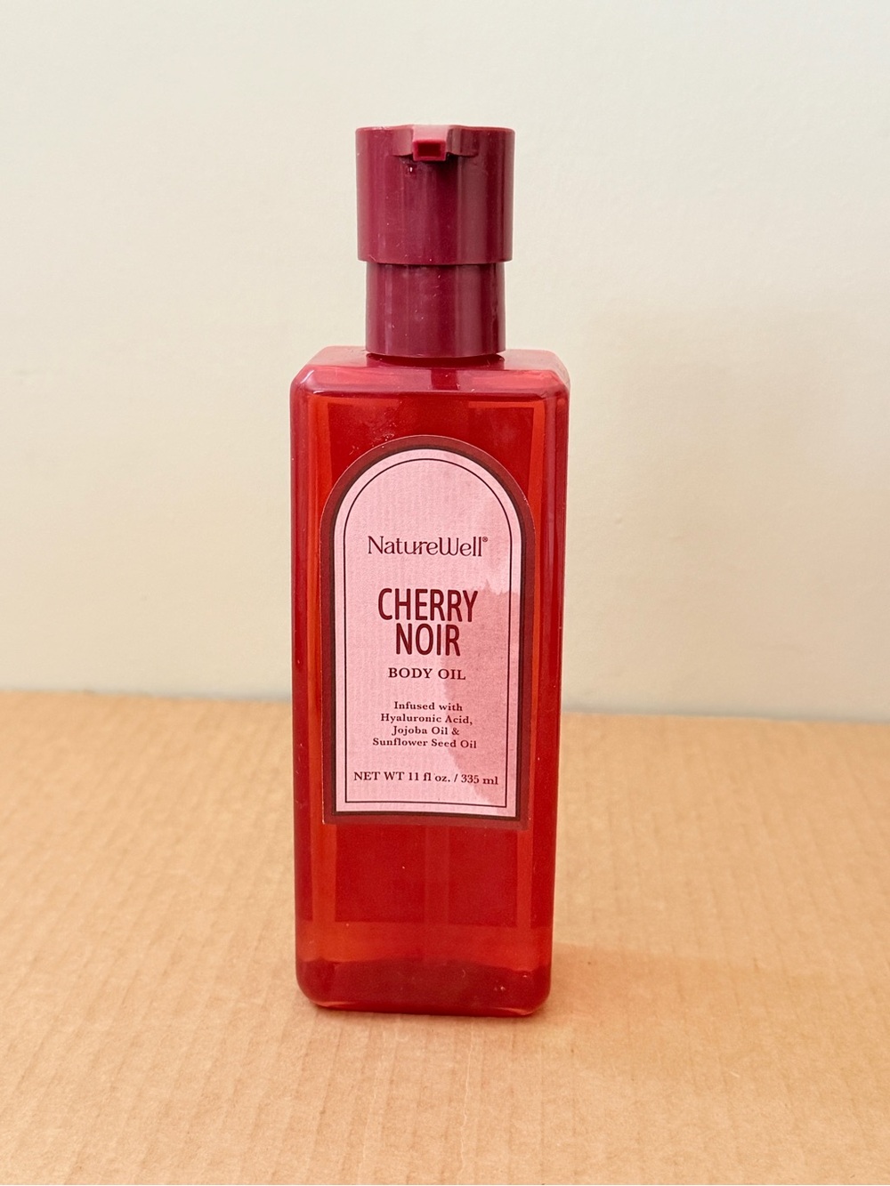 NatureWell Cherry Noir Body Oil 11 fl oz -Stained Bottle Label